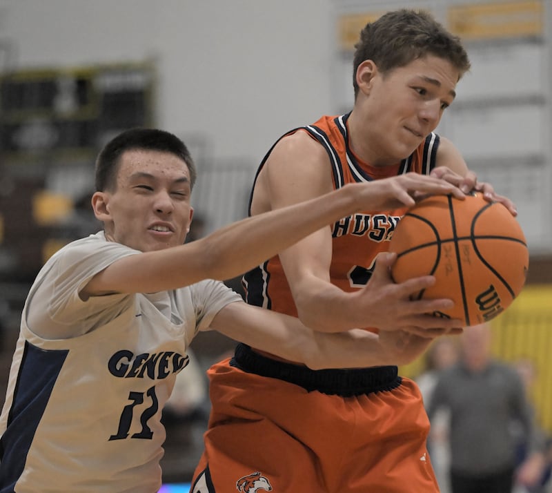 Geneva’s Kyle Suger loses a rebound to Naperville North’s Miles Okyne in a boys basketball game at the Jacobs Hinkle Classic semifinals in Algonquin on Tuesday, Dec. 23, 2025.