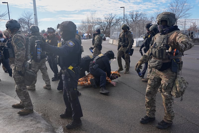 Protesters demonstrate against Immigration and Customs Enforcement (ICE) after Renee Good, who was fatally shot by an ICE officer last week, Monday, Jan. 12, 2026, in Minneapolis. (AP Photo/Jen Golbeck)