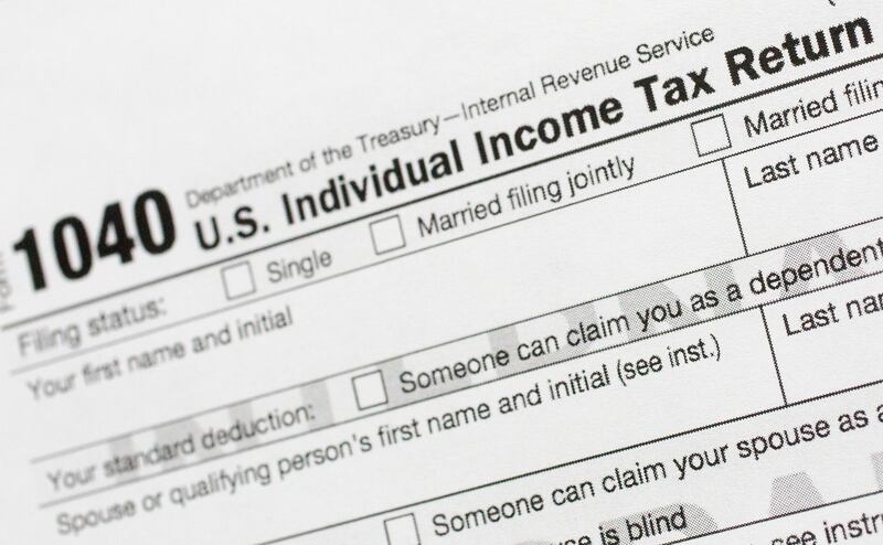 FILE - A portion of the 1040 U.S. Individual Income Tax Return form is shown July 24, 2018, in New York. (AP Photo/Mark Lennihan, File)
