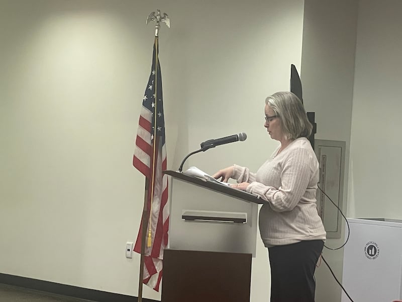 Family Service Agency of DeKalb County executive director Tynisha Clegg addresses the DeKalb Planning and Zoning Commission at its Dec. 1, 2025, regular meeting.