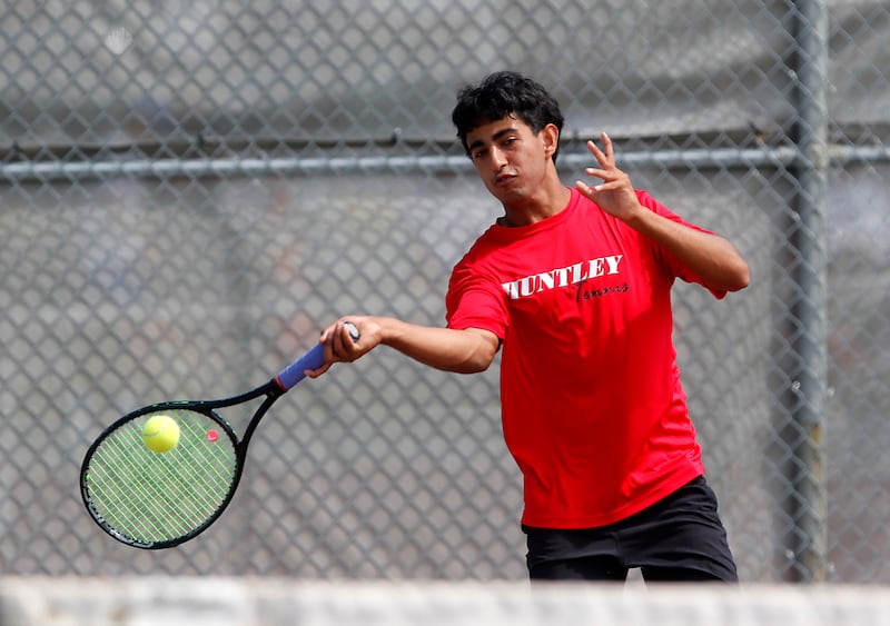 Huntley’s Tanush Gulati returns the ball as he and his doubles partner, Vivek Yandamuri, competes in the Class 2A Boys State Tennis Tournament on Thursday, May 29, 2025, at Palatine High School.