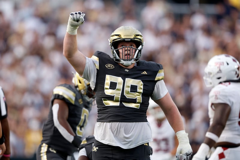 Georgia Tech defensive lineman Jordan van den Berg reacts after a sack against Temple during the second half of an NCAA college football game, Saturday, Sept. 20, 2025, in Atlanta. (AP Photo/Butch Dill)