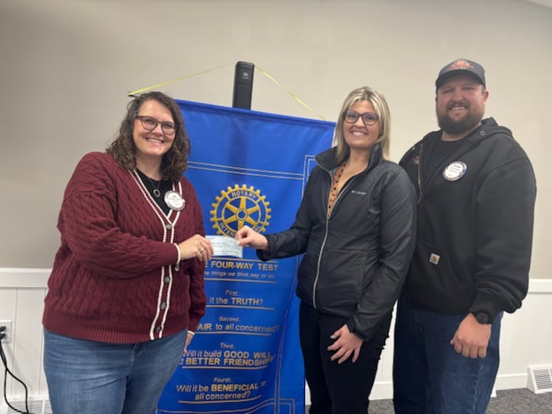 Rock Falls Rotary donated $250 to support the non-profit organization Path to the Future which provided meals to 72 families at Thanksgiving and 110 families at Christmas in our community. President Jenn Schultz (left) presents the check to organization founders Emily
Juist and Devon Nicklaus (right).