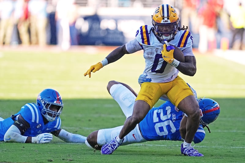 LSU wide receiver Zavion Thomas (0) breaks away from Mississippi linebacker Tahj Chambers (26) during the second half of an NCAA college football game in Oxford, Miss., Saturday, Sept. 27, 2025. (AP Photo/Rogelio V. Solis)