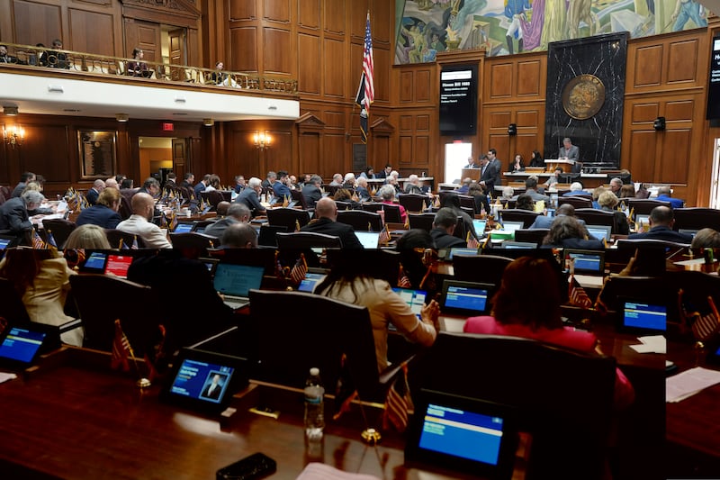 Lawmakers work in the House chamber at the Indiana Statehouse in Indianapolis, Wednesday, April 23, 2025. (AP Photo/AJ Mast)