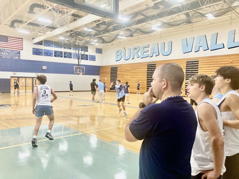Bureau Valley coach Jason Marquis, a BV alum, observes Thursday's Storm practice at the Storm Cellar. The Storm hope to carry over last year's success as undefeated Lincoln Trail Conference championship.