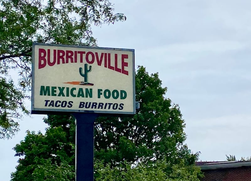 The sign for Burritoville, 1026 W. Hillcrest Drive, DeKalb, stands outside the restaurant on Tuesday, Aug. 12, 2025.