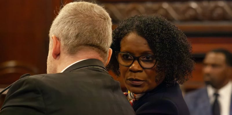 State Sen. Andriene Johnson talks to Planned Parenthood Illinois Action lobbyist Michael Zirir during a Senate committee hearing on Wednesday, April 29, 2026.