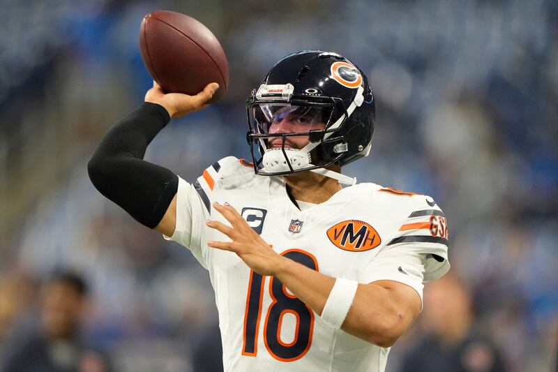 Chicago Bears quarterback Caleb Williams (18) throws before an NFL football game in Detroit, Sunday, Sept. 14, 2025. (AP Photo/Ryan Sun)