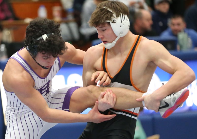 Dixon's Preston Richards wrestels Sandwich's Cooper Corder during the Class 1A Regional meet on Saturday, Jan. 31, 2026 at Princeton High School.