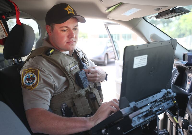 La Salle County Sheriff's Deputy Corbin Flynn preps for his day on Wednesday, July 2, 2025, at the La Salle County Government Complex in Ottawa. Police recruiting numbers are finally on the upswing after years of low interest in law enforcement careers. Flynn is among the recently-sworn officers who've helped reverse the trend.
