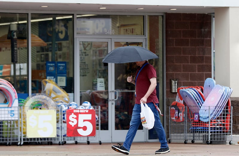 A shopper walks past the Five 
Below store in Crystal Lake on Friday, June 28, 2024. The McHenry County sales tax rate increases on Monday.