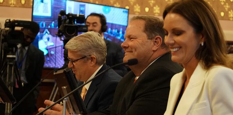 Sen. Patrick Joyce, (center) D-Essex, speaks in favor of his bill to expand horse racing in Illinois alongside Jeff Davis, president of the Illinois Harness Horsemen’s Association, and Nicole Bateman, president of the Economic Development Corporation of Decature-Macon County.