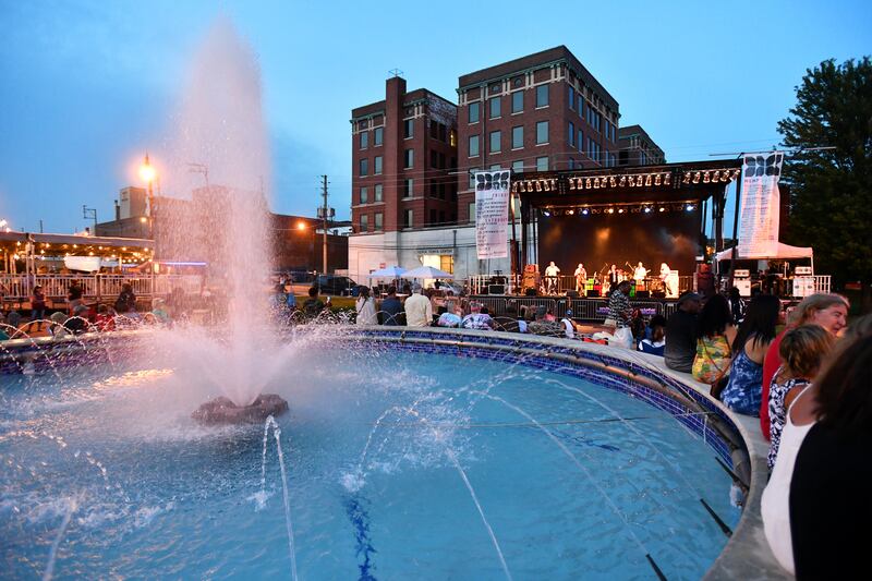 Attendees surround the fountain at the Harold & Jean Miner Festival Square during the 2023 Merchant Street MusicFest in downtown Kankakee.