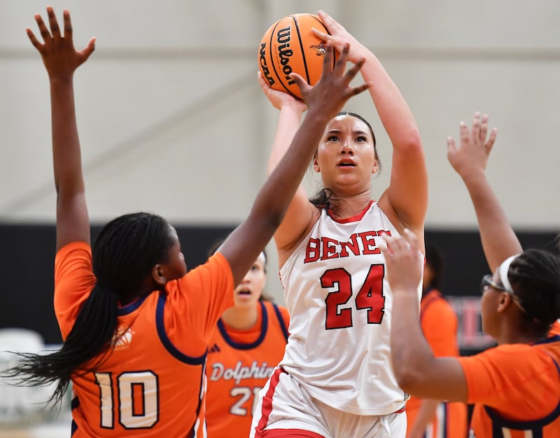 Benet’s Emma Briggs shoots and scores while surrounded by Whitney Young defenders during a Coach Kipp Hoopsfest game on January 19, 2026 at Benet Academy in Lisle.