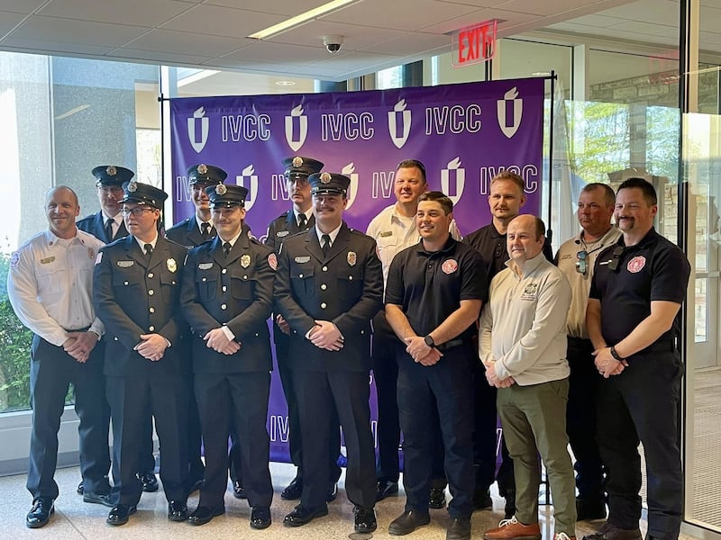 Ottawa Fire Department graduates of the IVCC paramedic program pose for a photo with fellow firefighters and city officials following the ceremony.