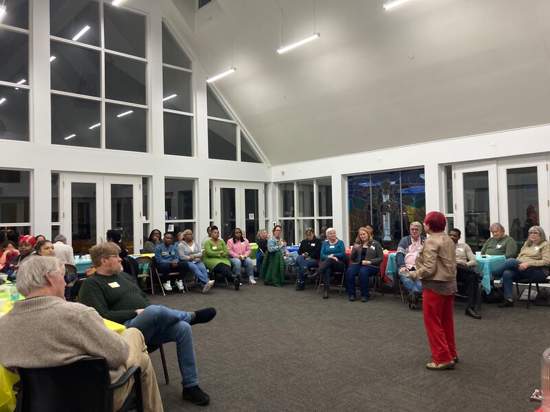 Common Table DeKalb's story-sharing facilitator Dr. Ada Cheng addresses attendees at a March 7, 2025 event held at New Hope Missionary Baptist Church in DeKalb.