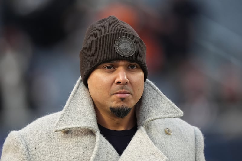 Chicago Bears general manager Ryan Poles walks on the field prior to an NFL football divisional playoff game against the Los Angeles Rams Sunday, Jan. 18, 2026, in Chicago. (AP Photo/Nam Y. Huh)