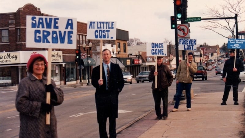 Residents show their support for a referendum 30 years ago to purchase land to save Lyman Woods in Downers Grove.
