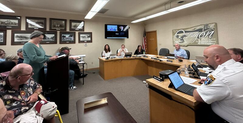 Veronica Mathews (left) speaks to the Oregon City Council on Tuesday, May 13, 2025 against a proposed ordinance to require permits for public demonstrations.