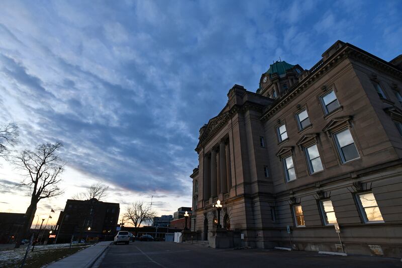 The sun sets behind the Kankakee County Courthouse on Jan. 12, 2022.