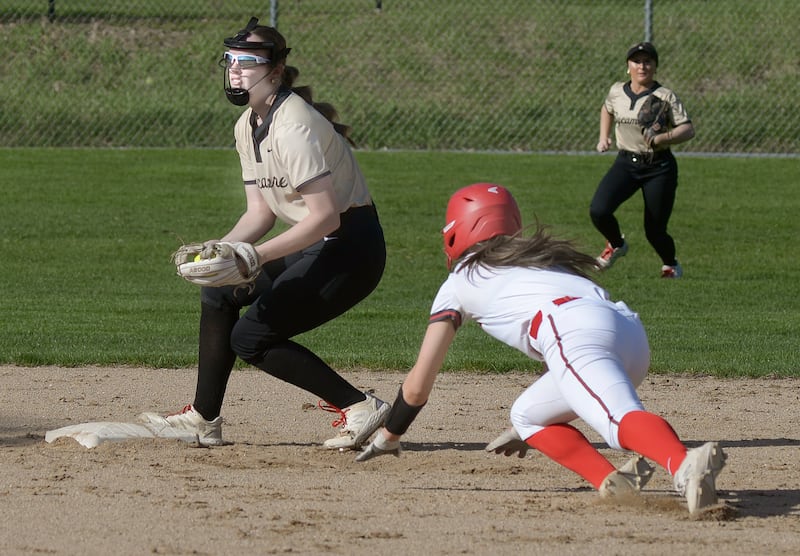 Sycamore’s Brighton Snodgrass gets the tag on 2nd base to force out Ottawa’s Annamaria Corsolini in the 3rd inning Wednesday at Ottawa.