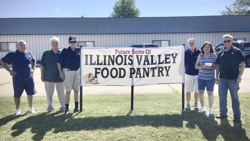The Utica Fr. Marquette Council of the Knights of Columbus donated $2,000 to the Illinois Valley Food Pantry’s “Feeding the Future” fund drive as they begin their move to a larger facility on Tuesday, July 1, 2025, in Peru. 
Gathered to present the check were(from left)  Utica Knights Jim Polizzi, Chuck Voreis, Mike Brown, Greg Scullans, Illinois Valley Food Pantry executive director Mary Jo Credi, and Utica Grand Knight Eddie Pat Brown.