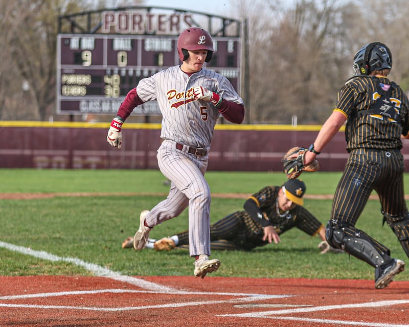 Lockport's David Kundrat (5) scores a run during WJOL Tournament quarterfinal baseball game between Lockport at Joliet West on Thursday, April 3, 2025 in Joliet.