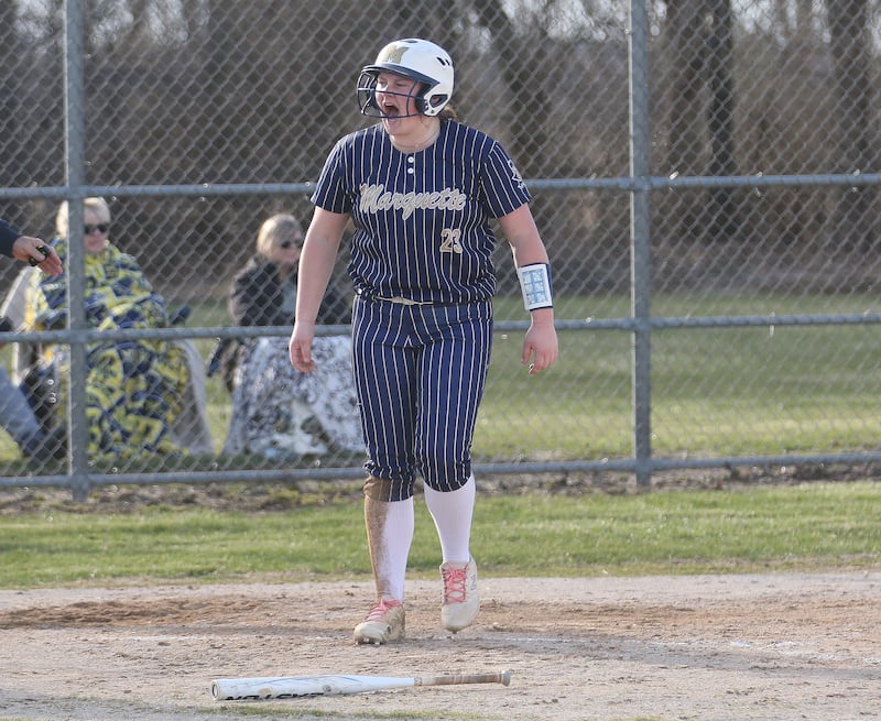 Marquette's Taylor Cuchra reacts after slideing safe into home plate against Serena on Wednesday, March 26, 2025 at Serena High School.