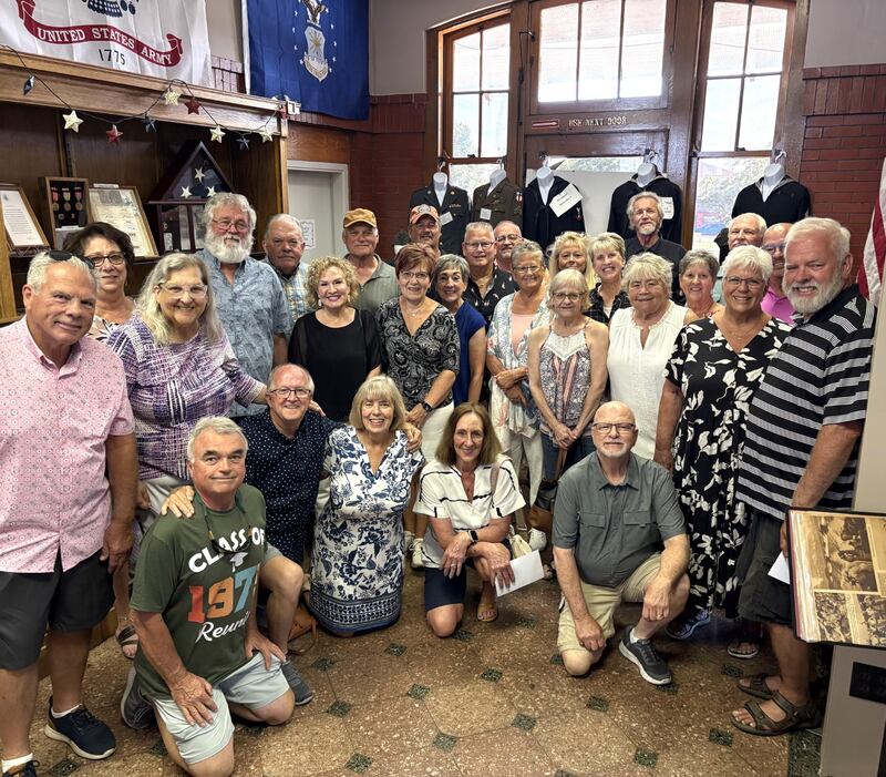 Members of the Marseilles High School Class of 1975 pose for a photo during their 50-year reunion. Front row, kneeling from left: Jim Corley, Kyle Bault, Debbie Gage Wheeler, Jan Sobinsky Kercheval and Wilbur “Craig” Hougas. Second row, standing from left: John Callahan, Lora Outman Clark, Paula Sutton Heaton, Jill Bailey Lowe, Marcia Hepner McGowan, Roberta “Bert” Allen Brockman, Nancy Wright Maltas, Carla White Elliott, Amy Farmer Swaar and John Budnick. Third row, standing from left: Vicki Nicholson, Robert “Bob” Rice, Dan McGowan, Mark Sharp, Mark Teele, Tricia Karr, Chris Smith Moe, Debbie Greer Blodgett and David Decker. Back row, from left: Randy Rafferty, Jerry Hicks, Darryl “Cajun” O’Neale and Robert “Bob” Williamson.