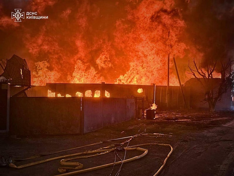 This photo provided by the Ukrainian Emergency Service shows a fire following a Russian attack in Kyiv region, Ukraine, Wednesday, July 9, 2025. (Ukrainian Emergency Service via AP)