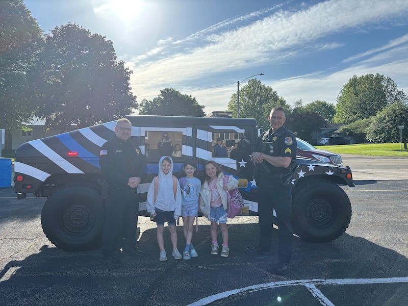 A group of Polo schoolchildren enjoyed a ride to school in the Polo Police Department’s newly-acquired humvee on May 21 after winning a local fundraising raffle.