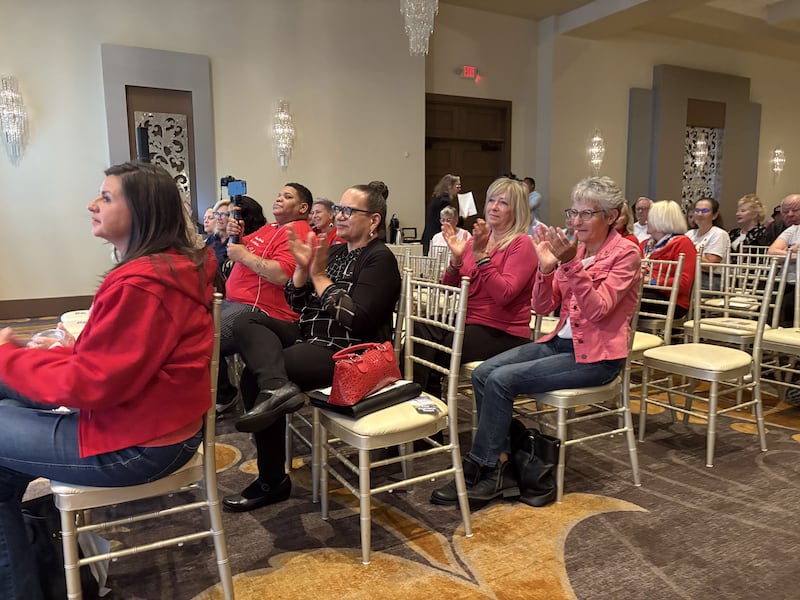 Attendees applaud during a MCGOPAC event in memory of Charlie Kirk Oct. 14, 2025.