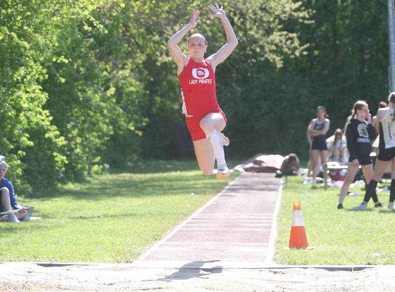 Ottawa's Savannah Markey competes in the long jump during the Interstate 8 Conference girls track championship on Friday, May 9, 2025 at Morris High School.