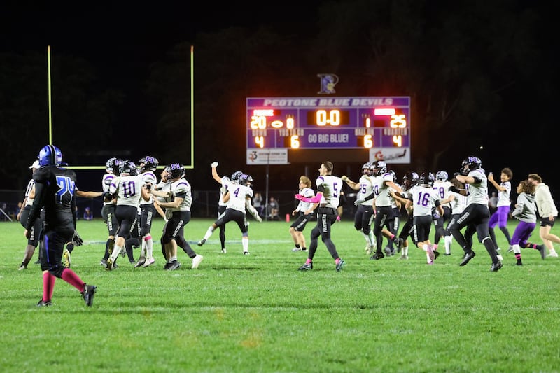Manteno players rush to celebrate as they secured a 25-20 victory over Peotone on Friday, Oct. 17, 2025, in the annual Rumble on Route 50 rivalry game.