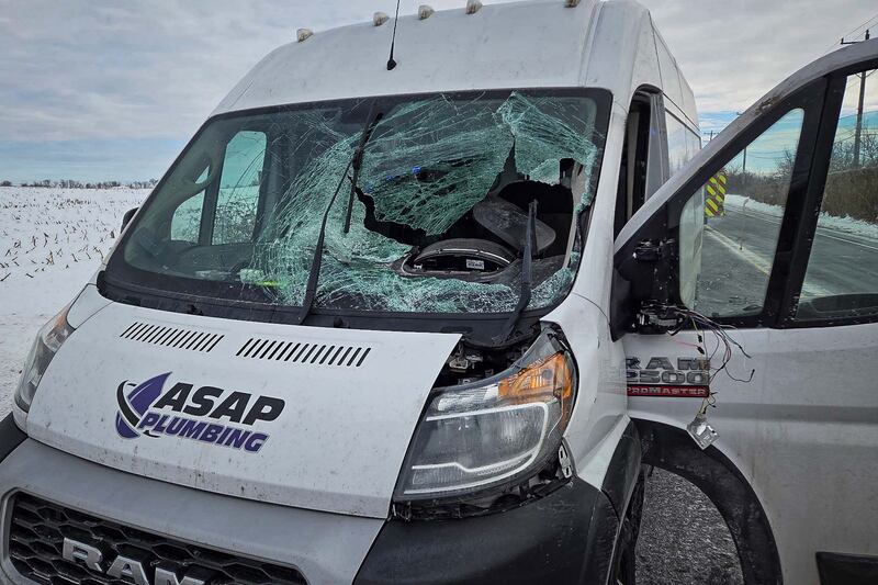 A windshield was damaged and a driver hospitalized after snow or ice fell onto the vehicle near Marengo Dec. 5, 2025.