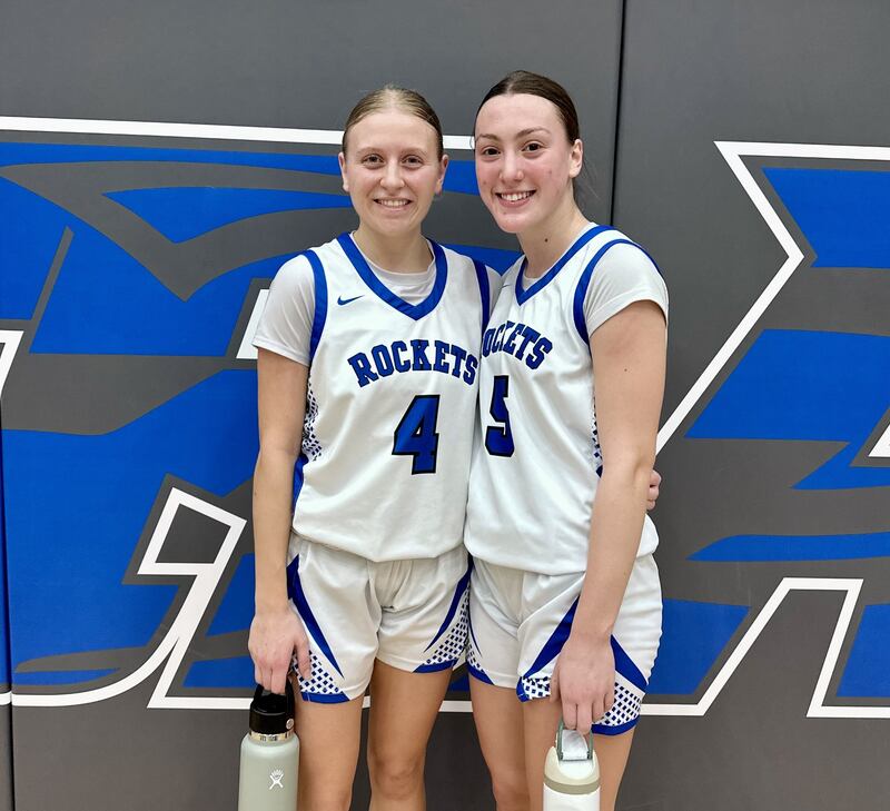 Ashley Waslo (left) and Audrey LaFleur helped limit Crystal Lake South to four first-quarter points in a 48-33 victory Monday evening.