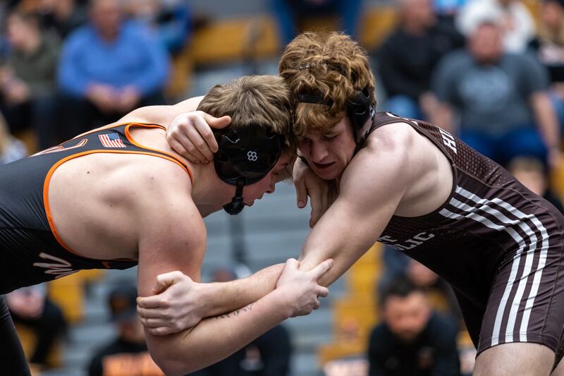Lincoln-Way West’s Max Herman and Joliet Catholic’s Nolan Vogel compete in the 165 pound match at Lincoln-Way West on Jan. 8, 2026.