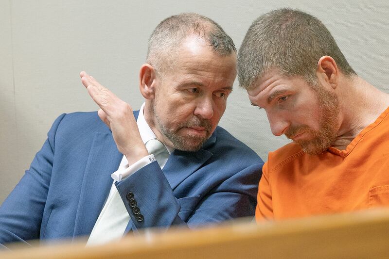 Defense attorney James Mertes (left) speaks with client Kyle Cooper (right) on Wednesday, March 19, 2025, in Whiteside County Circuit Court in Morrison. Cooper is charged with first-degree murder in connection with the Feb. 14 death of Daniel Gordon of Rock Falls. Cooper's jury trial is set for April 8.
