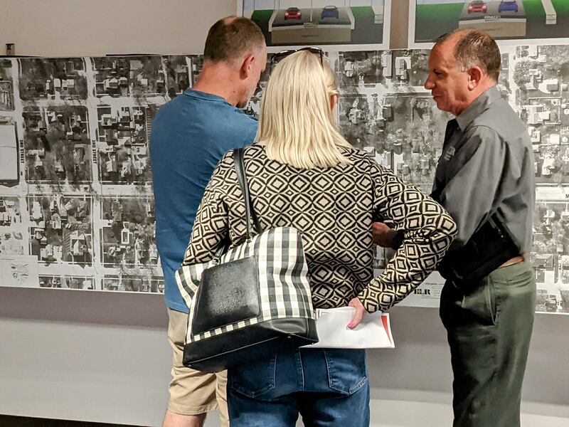 Project manager Don Ryba, right, of  civil engineering company Hampton, Lenzini and Renwick, Inc., talks to those who attended a pre-construction open house on May 22 for the North Main Street reconstruction project in Sandwich.