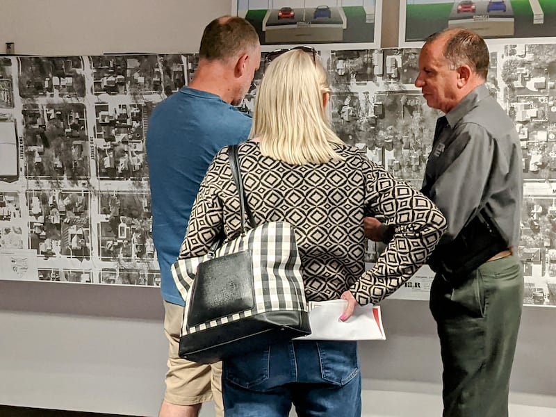 Project manager Don Ryba, right, of civil engineering company Hampton, Lenzini and Renwick, Inc., talks to those who attended a pre-construction open house on May 22 for the North Main Street reconstruction project in Sandwich.