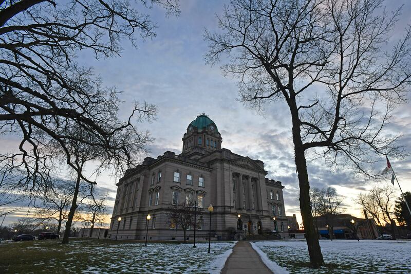The sun sets behind the Kankakee County Courthouse on Jan. 12, 2022.