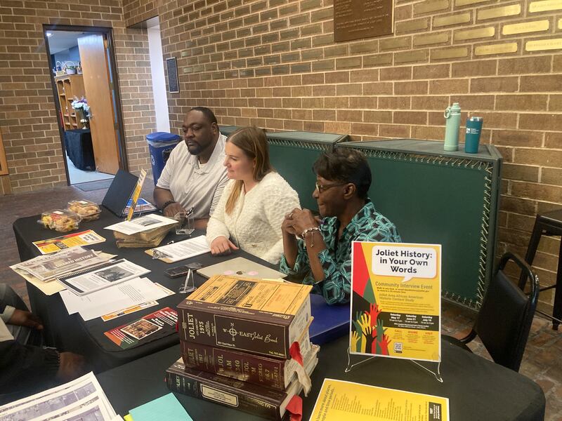 The Steering Committee for the Joliet Area African American Historic Context Study, Chris Parker, Elizabeth Blasius, and Julia Alexander prepare to conduct an interview with residents on Saturday, May 17, 2025.