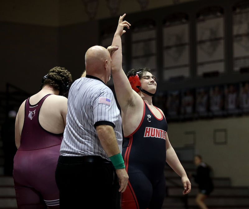 Huntley’s Ryan Trejo celebrates his pin of Prairie Ridge’s Bernardo Tavares Vigilato during the 285-pound match of a Fox Valley Conference boys wrestling meet on Thursday, Jan. 22, 2026, at Prairie Ridge High School Crystal Lake.