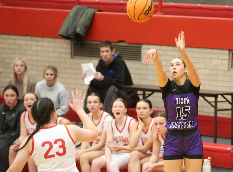 Dixon's Morgan Hargrave shoots a wide open shot over Ottawa's Mary Stisser on Wednesday, Dec. 3, 2025 in Kingman Gymnasium at Ottawa High School.