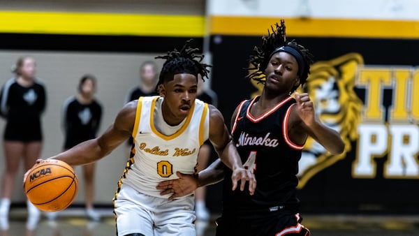 Photos: Joliet West Downs Minooka Boys Basketball