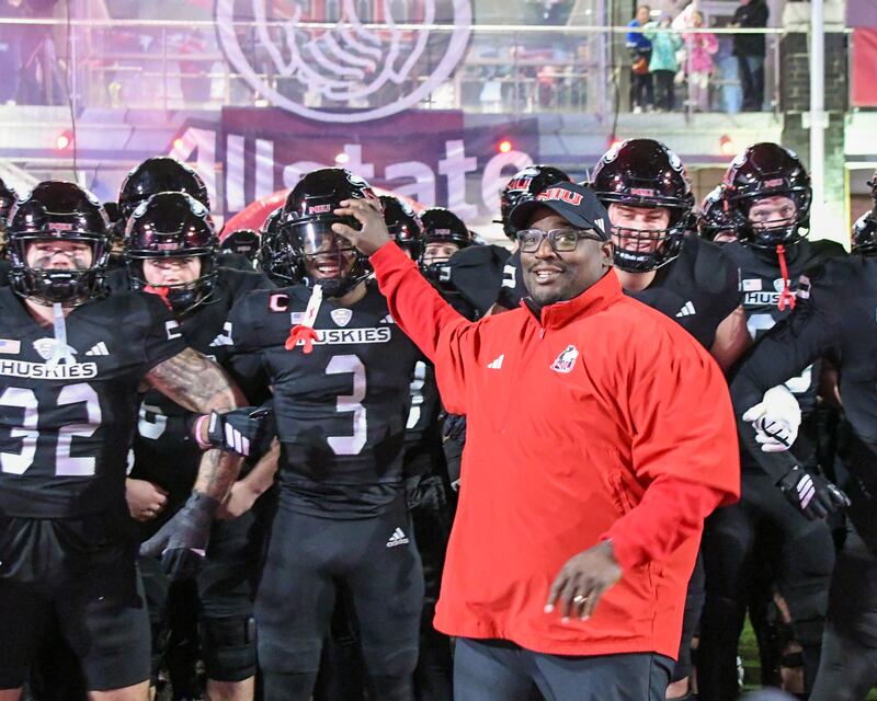 Northern Illinois University's head coach Thomas Hammock is all smiles before taking the field on Tuesday Nov. 18, 2025, to take on Western Michigan at Huskie Stadium in DeKalb.