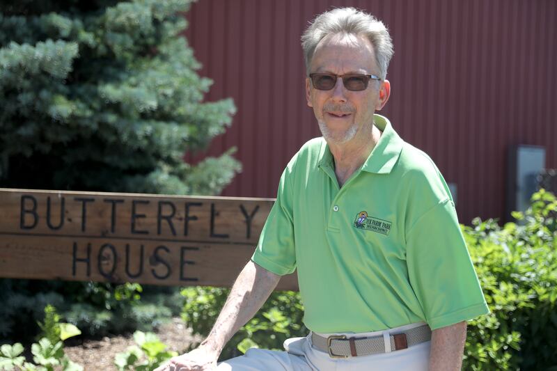 Air Force Veteran Larry Cabeen serves as the Geneva School District 304 board president as well as a volunteer at teh Peck Farm Park Butterfly House.