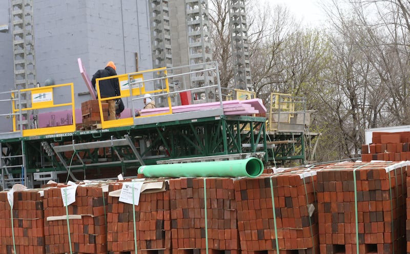 Many pallets of bricks are being used to build the exterior wall of the La Salle-Peru Township High School's new Agriculture Center on the southeast corner of Sixth and Creve Coeur streets on Wednesday, April 1, 2026 in La Salle.