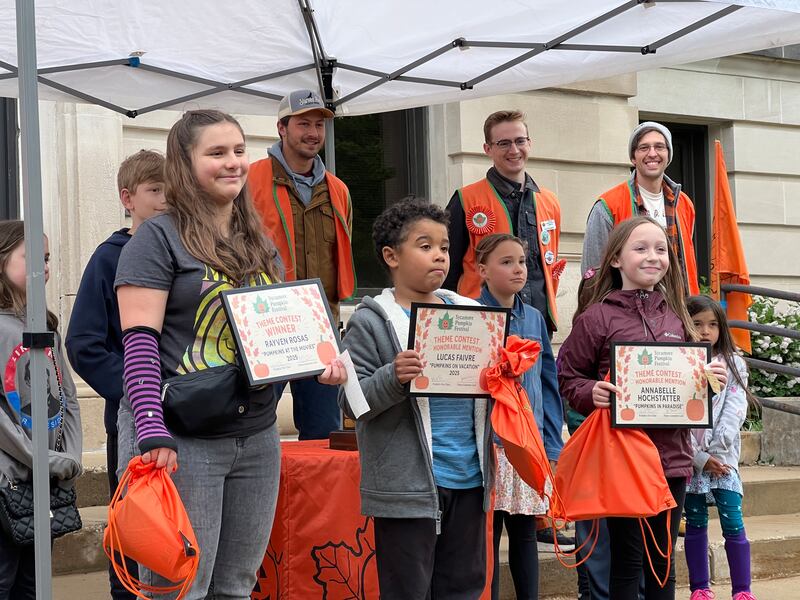 The winner of the 2025 Sycamore Pumpkin Festival theme contest, Rayven Rosas poses with the two honorable mentions, Lucas Faivre and Annabelle Hochstatter on May 21, 2025.